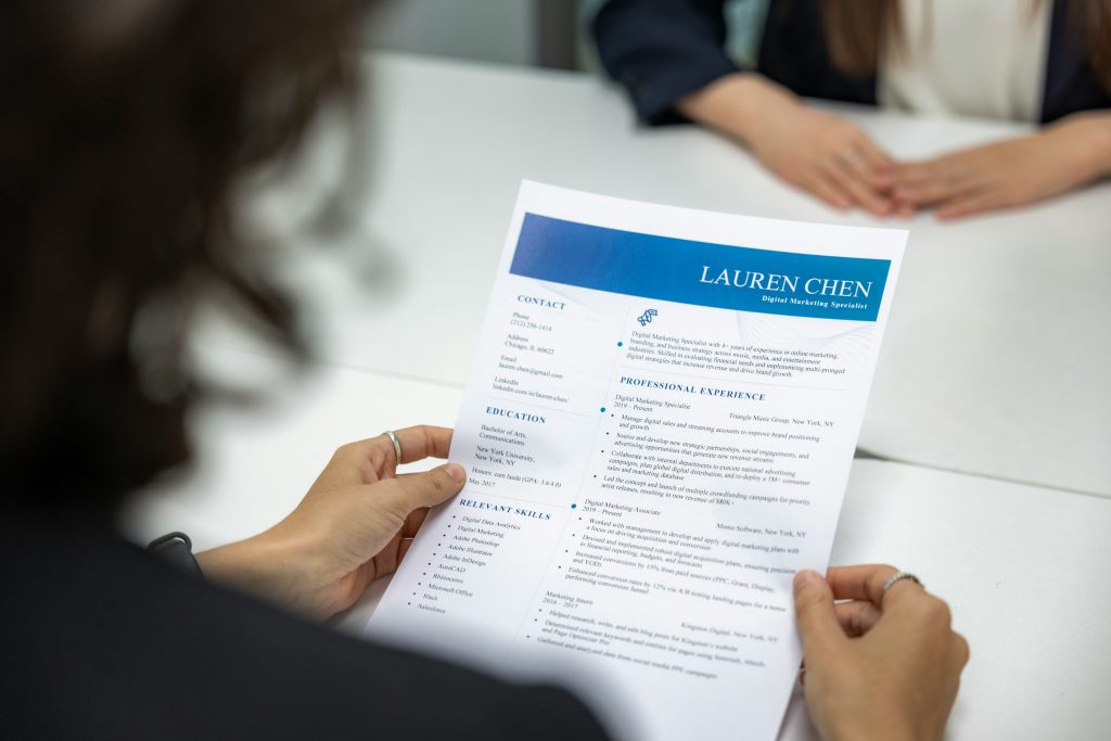 Closeup view of job applicant resume and CV paper during job interview